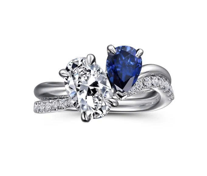 Gabrielny Complimentary Gifts. Receive a pair of Bujukan silver earrings and a travel case with any purchase of $500 or more.